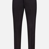 The Shawl Lapel Tuxedo Suit by ATELIER MUNRO features slim-fit black tailored pants with a waistband and side adjusters, ideal for formal events, shown on a plain white background.