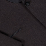 Close-up of the ATELIER MUNRO Shawl Lapel Tuxedo Suit in dark brown pure wool, featuring a black satin shawl lapel, single button closure, and welt pocket detail with visible fine tailoring.