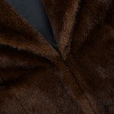 Close-up of The Mink Coat by Auter, featuring a dark brown animal-free design with a lapel and dark lining.