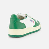The AUTRY Medalist Low Bicolor Sneakers are green and white low-tops with a retro design, cream-colored sole, and side Autry logo, shown from the rear on a white background.