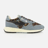 Sure! Here’s a rewritten version using your product data: The AUTRY Reelwind Low Pony Hair Sneaker, featuring gray and leopard-print pony hair uppers, a white sole, brown and black laces, and a blue “Autry” label on the side, is thoughtfully designed for an active lifestyle. Shown against a white background.
