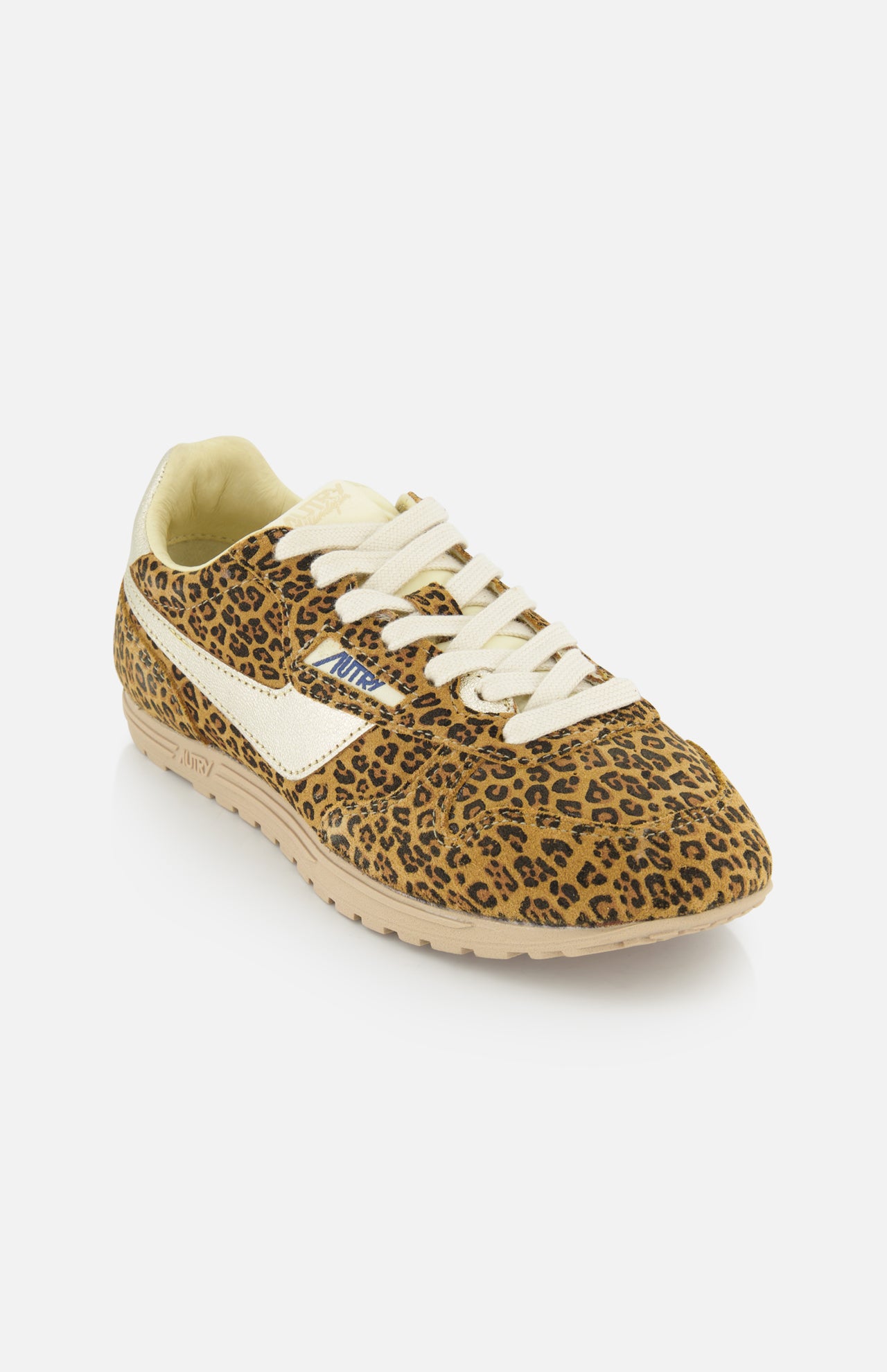 The AUTRY Windspin Leopard Low Sneaker channels 60s style with leopard print, cream laces, a white textured side stripe, and a light beige sole.