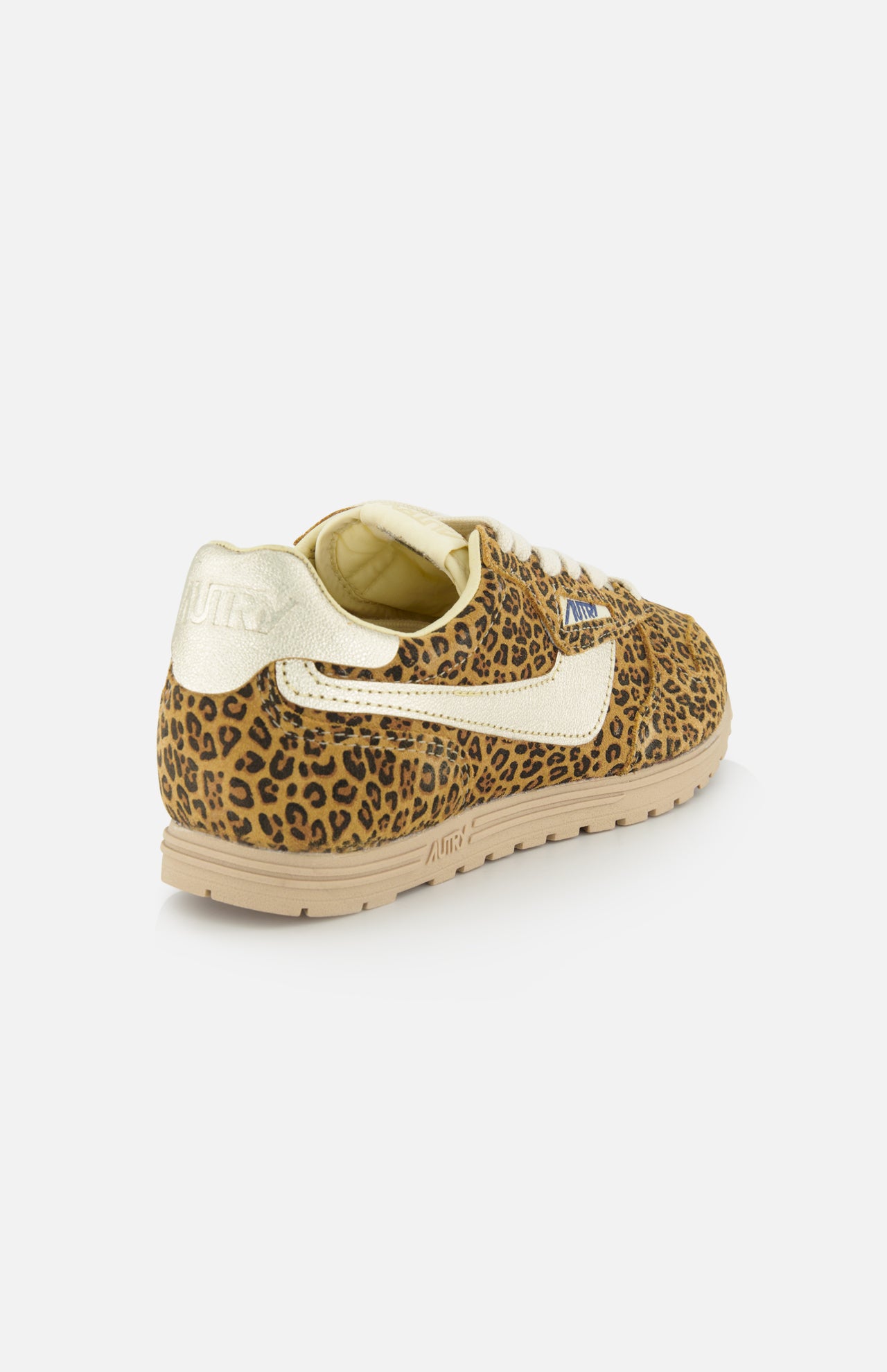 The AUTRY Windspin Leopard Low Sneaker features leopard print, gold metallic heel and swoosh, beige laces, and a light brown sole, shown from the back on a white background for retro 60s style flair.