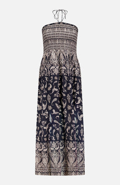 The Ayanna Paisley Print Maxi Dress by VERONICA BEARD is a sleeveless halter dress with a black and cream paisley print, strapless bodice, and thin crisscross ties, shown on a plain white background.