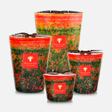 Four BAOBAB COLLECTION Arty Flowers Poppies Max 16 Candles in varying sizes, each with vibrant abstract red, green, and orange designs, feature a red logo label on the front. Hand-poured wax. Displayed against a white background.