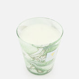 The BAOBAB COLLECTION Leaves Marius Max 16 Candle, a green and white marbled glass candle with three wicks and hand-poured wax, is displayed against a plain white background.