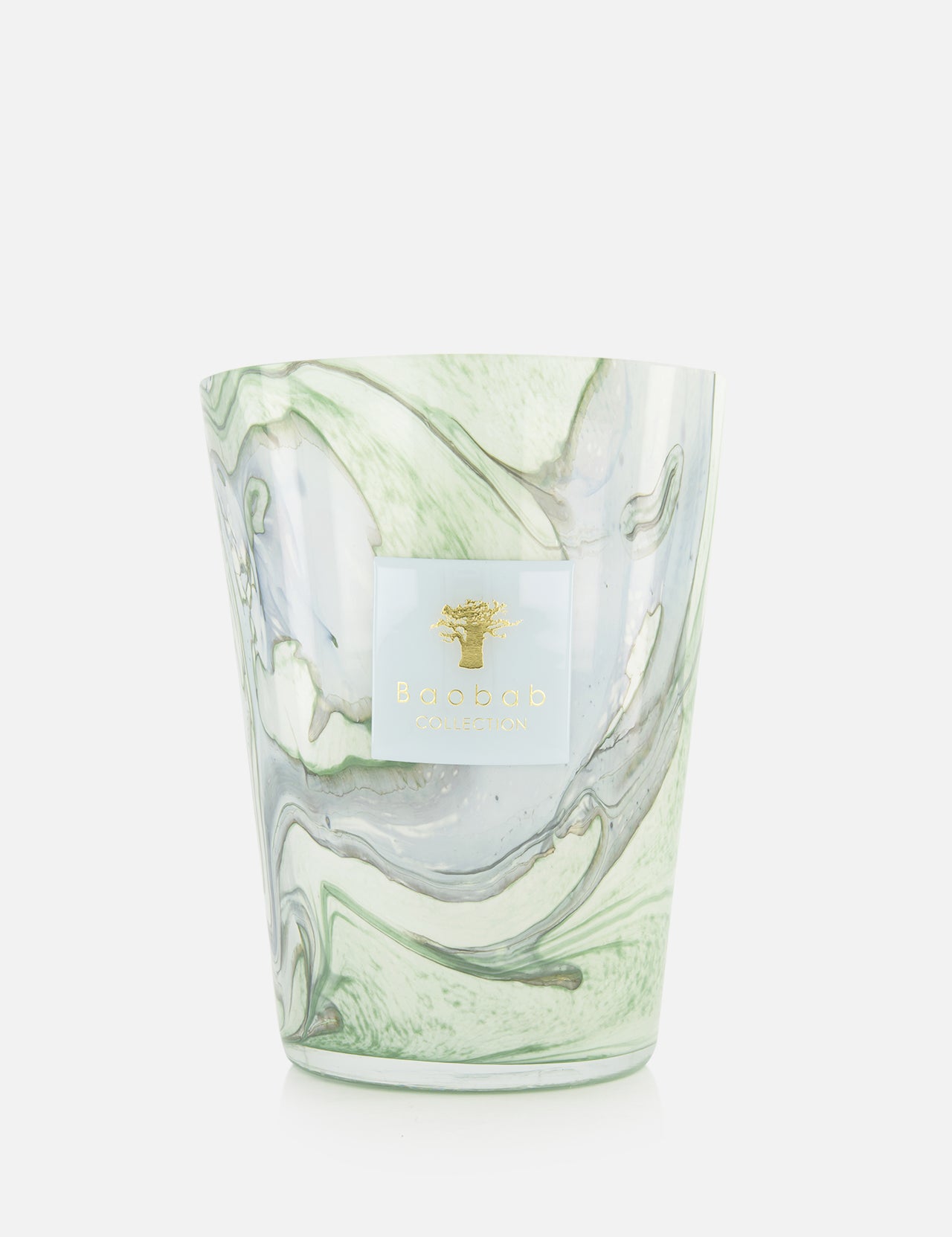 The Leaves Marius Max 24 Candle by BAOBAB COLLECTION features hand-poured wax in a marbled glass container with swirling green, grey, and white patterns and a white and gold brand label on the front.