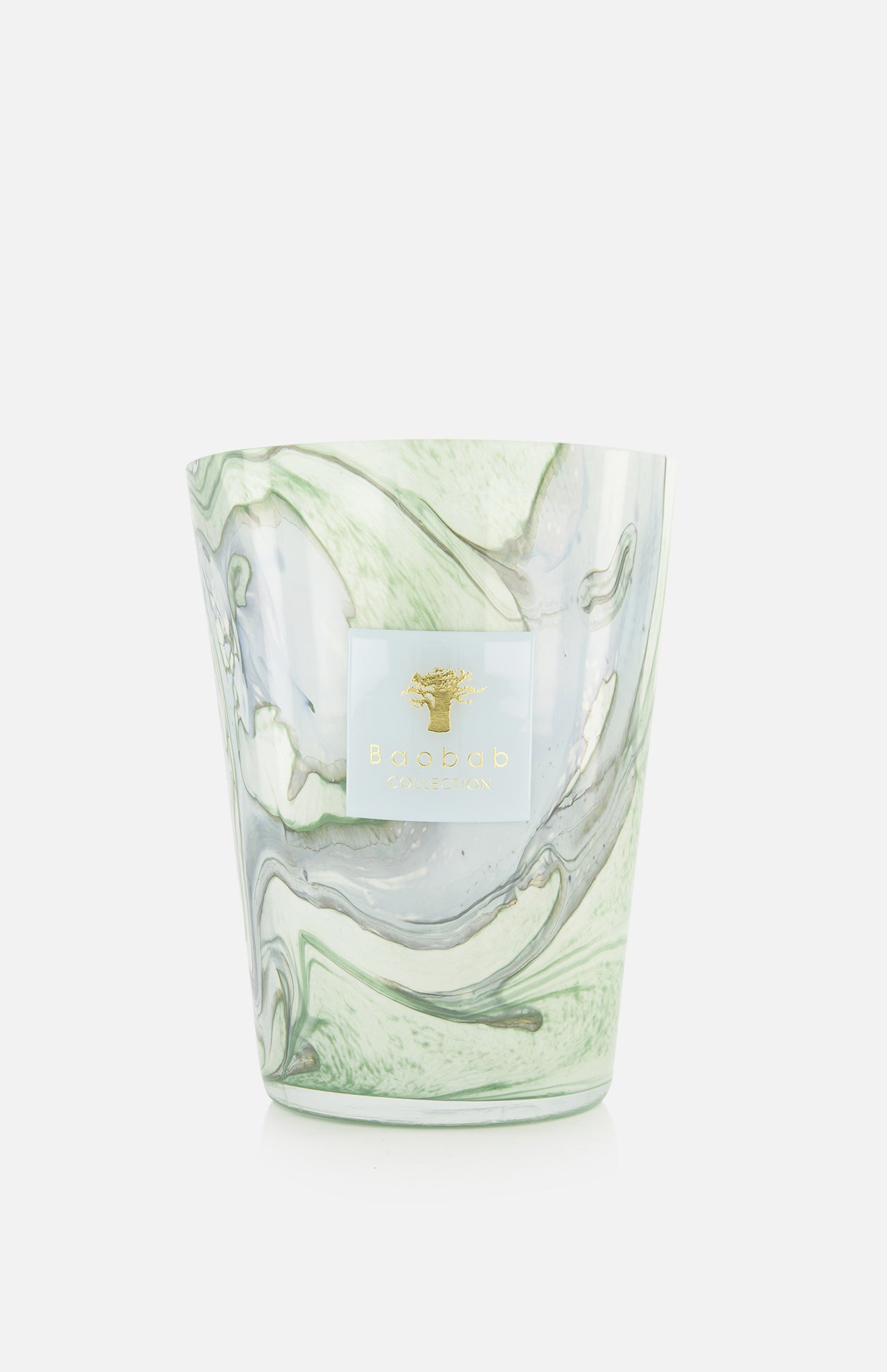 The Leaves Marius Max 24 Candle by BAOBAB COLLECTION features hand-poured wax in a marbled glass container with swirling green, grey, and white patterns and a white and gold brand label on the front.