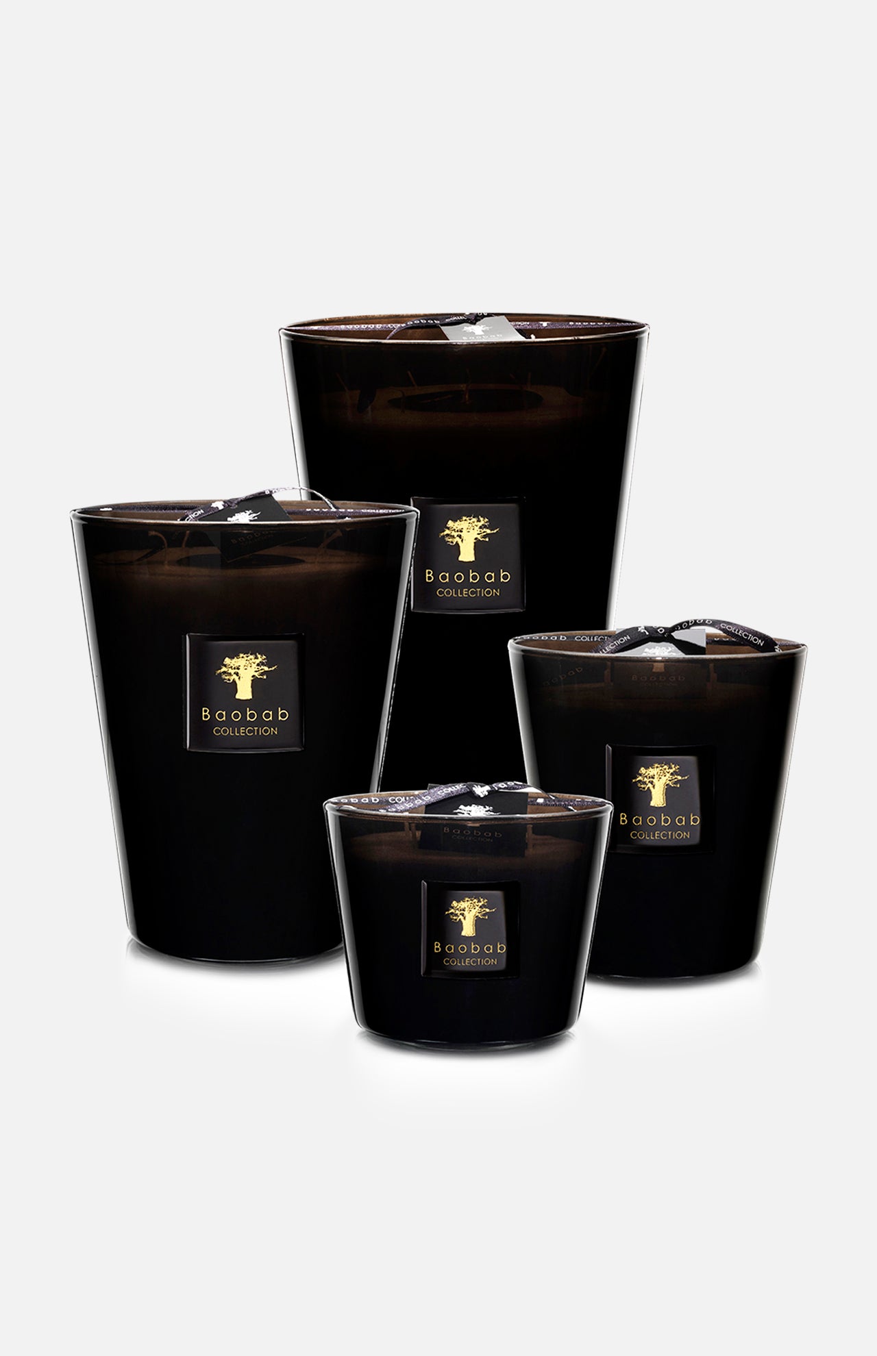 The BAOBAB COLLECTION Les Prestigieuses Encre De Chine Max 35 Candle stands out on a plain white background, featuring a sleek black glass design with a gold logo label, promising long burn time and refined elegance.