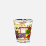 The Provence Max 16 Candle by BAOBAB COLLECTION features colorful, David Hockney-inspired floral illustrations and a pink Baobab Collection label, displayed on a plain white background.