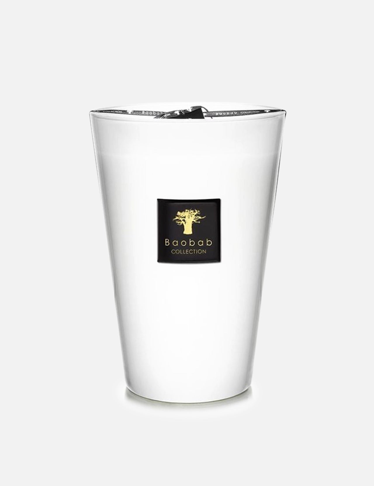 The BAOBAB COLLECTION Max 24 Les Prestigieuses Pierre de Lune Candle is a white, hand-poured wax candle in a sleek glass with a black and gold brand label, displayed against a plain light gray background.