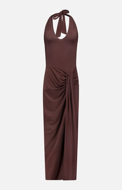 The Donatella Cascading Detail Maxi Dress by BAOBAB features a sleeveless chocolate brown halter-neck, keyhole neckline, ruched waist, and a draped skirt that falls to mid-calf.