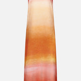 The Lola Open Back Maxi Dress by BAOBAB features a strapless, floor-length silhouette in a tangerine gradient of warm orange, yellow, and pink hues, shown against a plain white background.