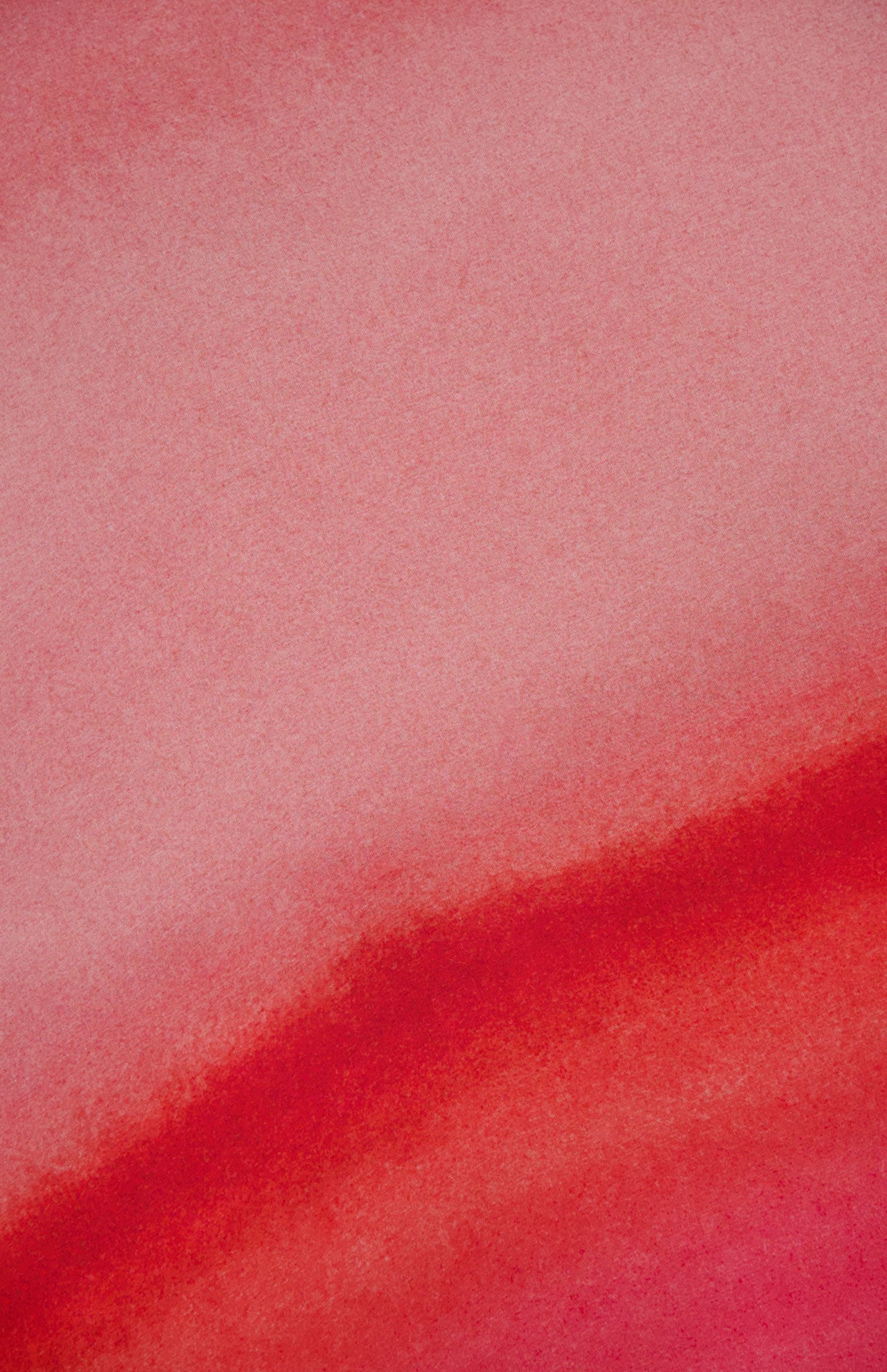 A soft, abstract background with blended pink and red tones inspired by the Magia Salvaje Halter Maxi Dress from BAOBAB, featuring a gentle watercolor effect reminiscent of the dress’s vibrant hues.