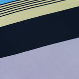 Abstract image with diagonal stripes in blue, purple, black, and light yellow colors reminiscent of the BAOBAB Rita Striped Maxi Dress—a chic maxi dress perfect for summer parties. Multiple thin black lines run parallel across the upper section against a blue background. There are no recognizable objects.