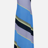 The Rita Striped Maxi Dress by BAOBAB is a sleeveless, ankle-length style featuring adjustable straps and diagonal stripes in shades of blue, lavender, black, and light yellow on a white background—perfect for summer parties.