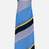 The Rita Striped Maxi Dress by BAOBAB is a sleeveless, ankle-length dress featuring thin adjustable straps and an abstract diagonal stripe pattern in blue, lavender, and black on smooth fabric—perfect for summer parties.
