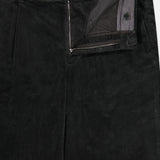 Close-up of BARENA Cortivo Corduroy Pants in dark grey, showcasing a partially open zipper and buttoned waistband, with visible interior details and brand label inside the waistband. Expertly crafted in Italy.