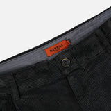 Close-up of the Cortivo Corduroy Pants by BARENA, featuring dark grey corduroy fabric, a button closure, and an orange BARENA label on the waistband, expertly crafted in Italy.