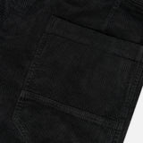 Close-up of a black corduroy fabric with a visible pocket, highlighting the texture and vertical ridges characteristic of corduroy material, as featured on the BARENA Cortivo Corduroy Pants made in Italy.