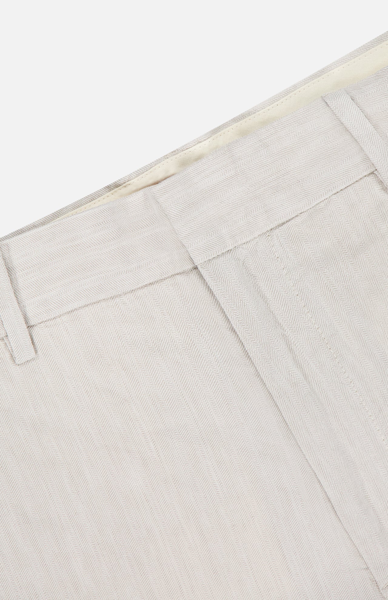 Close-up of the waistband and upper section of BARENA's Delfo Lisca Herringbone Pants in light beige, highlighting a belt loop, detailed waistband stitching, and the subtle herringbone weave texture.