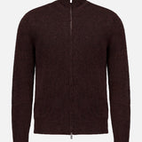 The Narci Zipped Up Sweater by BARENA is a sophisticated dark brown knit cardigan featuring a high collar, zip front, and long sleeves. Crafted from soft, textured alpaca fabric, this sweater boasts a simple, understated design and is photographed against a white background.