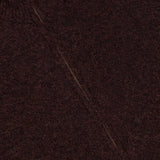 Close-up of the Narci Zipped Up Sweater by BARENA, featuring a fuzzy, dark brown knit with a prominent zip-front and a small white tag near the collar. The texture of the Italian-made fabric and zipper details are clearly displayed, emphasizing its quality craftsmanship.