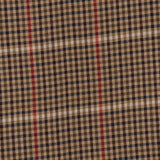 A close-up of the Washed Kildonan Bryce Scarf by BEGG & CO, showcasing its checkered pattern with black and white checks accented by thin red vertical stripes on a tan background—embodying the timeless elegance of a cashmere scarf expertly crafted in Scotland.