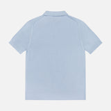 The BELSTAFF Coast Knitted Waffle Polo Shirt in light blue cotton-silk is laid flat, shown from the back against a white background, highlighting its ribbed collar, cuffs, hem, and Johnny collar detail.