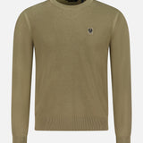 The BELSTAFF Coast Knitted Sweater is a light olive green, long-sleeve top with a lightweight waffle texture, crew neck, ribbed cuffs and hem, and a small embroidered crest logo on the left chest. Shown on a plain white background.