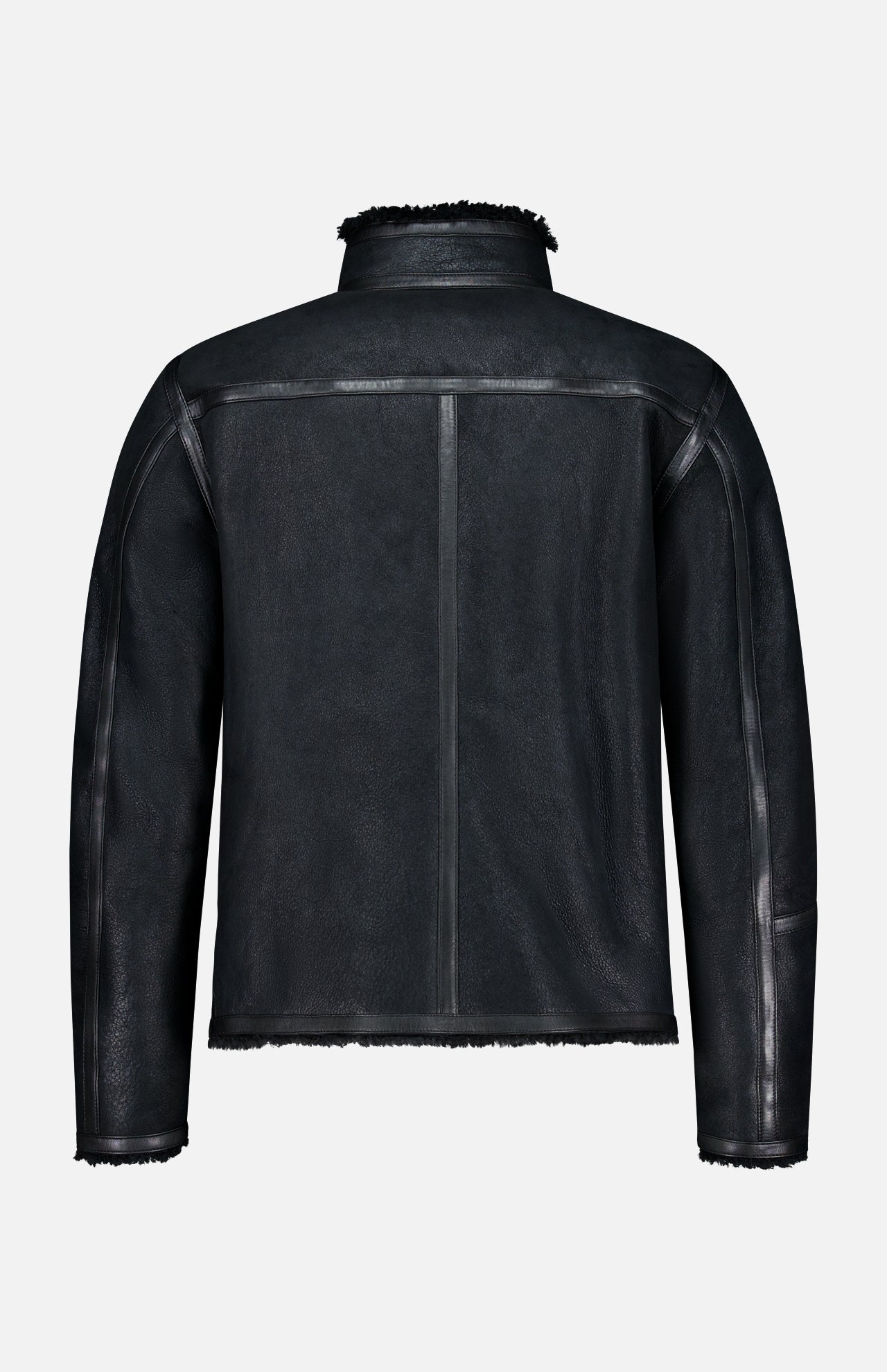 The BELSTAFF Highland Shearling Jacket in black is shown from the back, highlighting a straight center seam, visible side seams, and plush shearling lining at the hem, cuffs, and collar. Inspired by classic British heritage style, it is set against a light gray background.