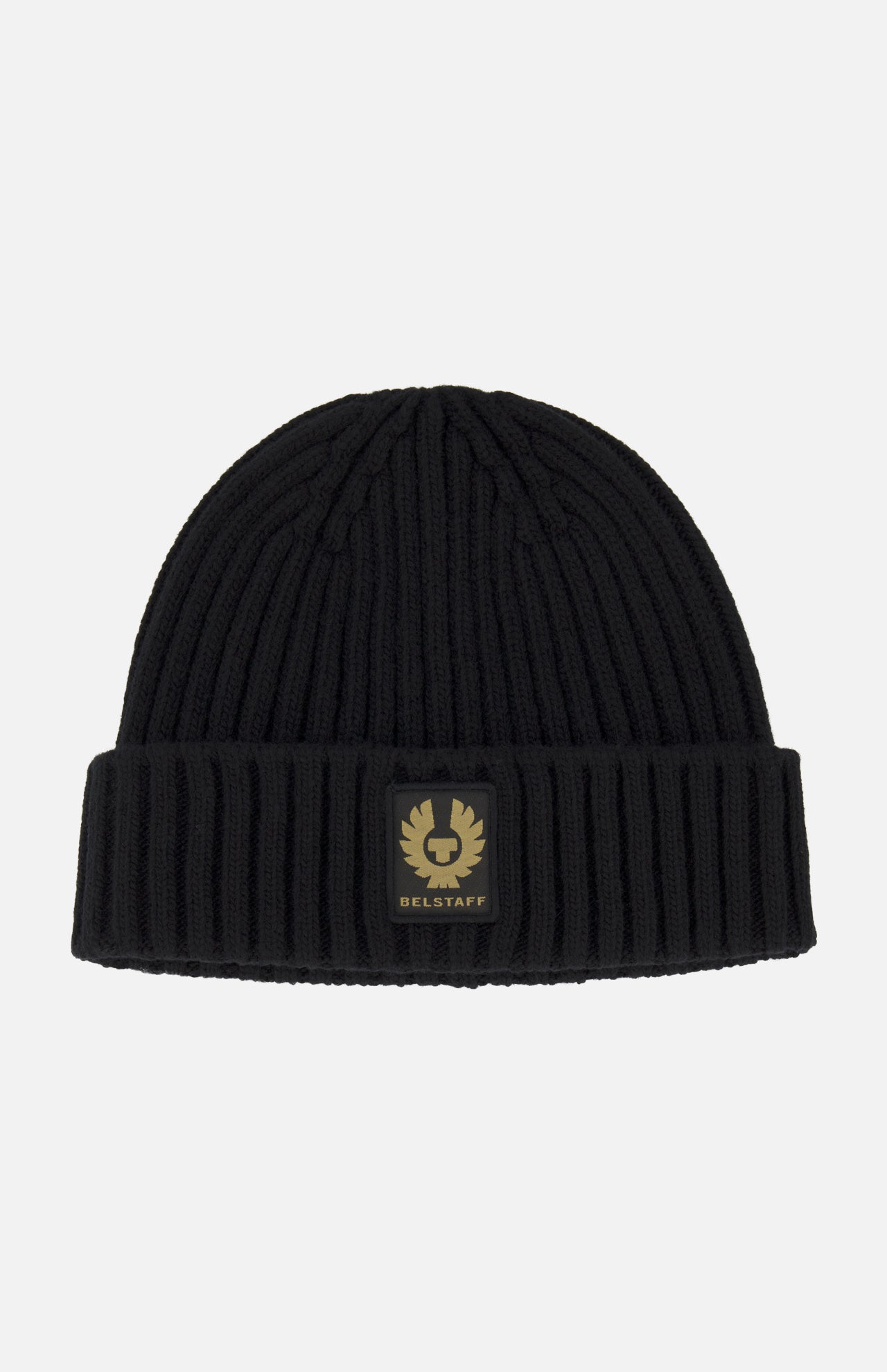 The BELSTAFF Watch Beanie Hat is a black ribbed knit wool beanie with a folded brim, accented by a rectangular black and gold BELSTAFF logo patch on the front.