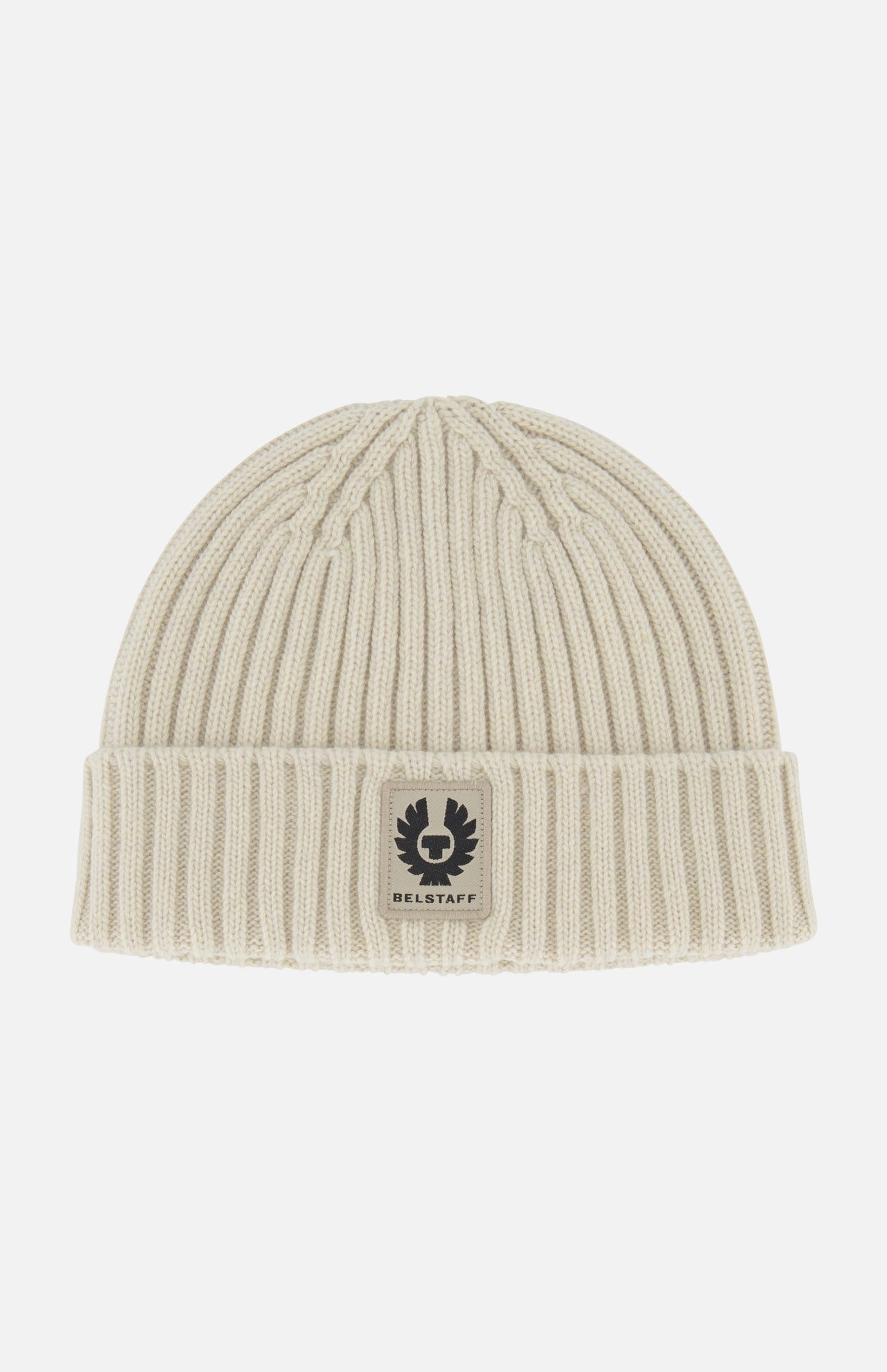 The BELSTAFF Watch Beanie Hat is a cream-colored, ribbed knit lambswool beanie with a folded cuff and a rectangular Belstaff logo patch on the front—a must-have for your cold-weather accessory lineup.