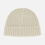 A beige Watch Beanie Hat by BELSTAFF, featuring ribbed knit wool and a folded brim, displayed on a white background—an essential cold-weather accessory.