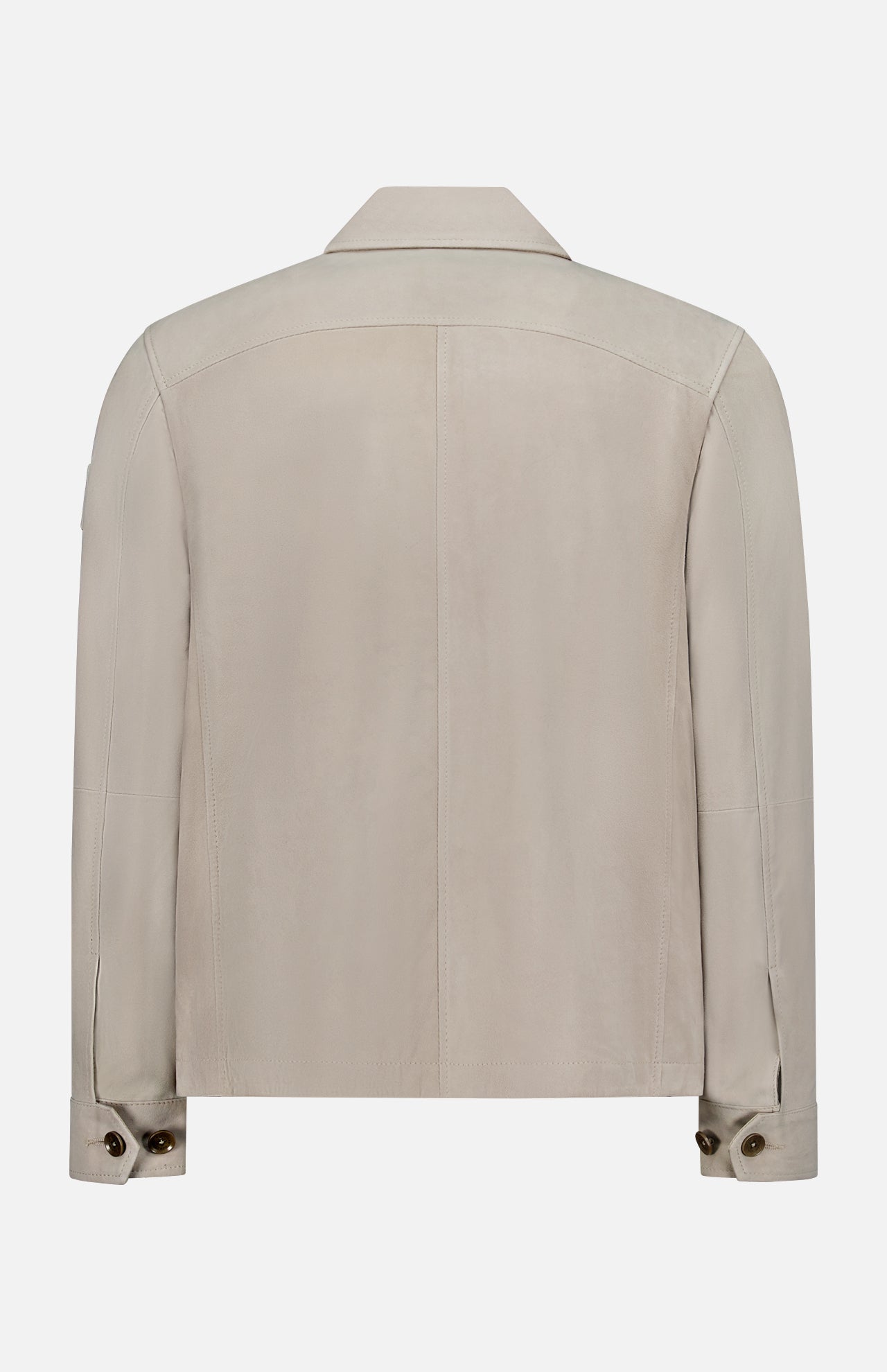 The BELSTAFF Waymark Suede Overshirt in beige goat suede features a pointed collar, long sleeves with buttoned cuffs, minimal seams, and a simple, refined design—ideal as a lightweight layering piece.