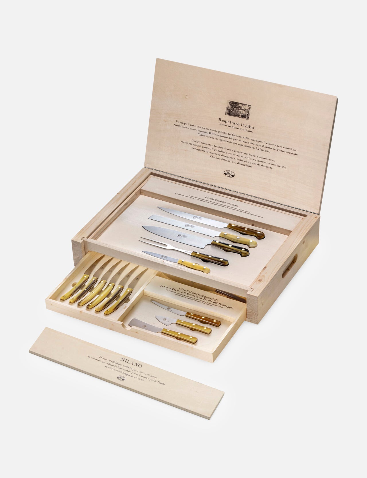 An open Milano Knives Box Set (Set of 15) by Berti Cutlery displays handmade knives with gold handles in a wooden presentation box, with printed logos on the lid and a tray for extra knives—a refined, luxury kitchen gift set.