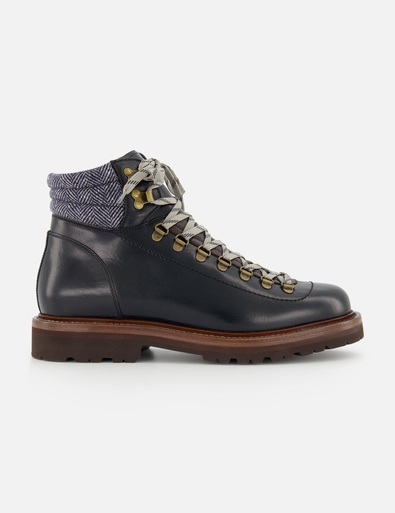 The BRUNELLO CUCINELLI Leather Hiking Ankle Boots feature black leather, a brown sole, gray and white laces, gold eyelets, and a textured padded ankle collar for classic style against a white background.