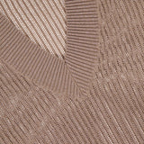 Close-up of a taupe BRUNELLO CUCINELLI Lurex Cotton Echo Long Sleeve Pullover Sweater featuring ribbed edges, subtle shimmer, and a visible fabric label in the upper left corner.