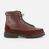 A single BRUNELLO CUCINELLI Leather and Suede Ankle Boot, inspired by classic hiking boots and featuring a thick, ridged sole, is shown in profile against a plain white background.
