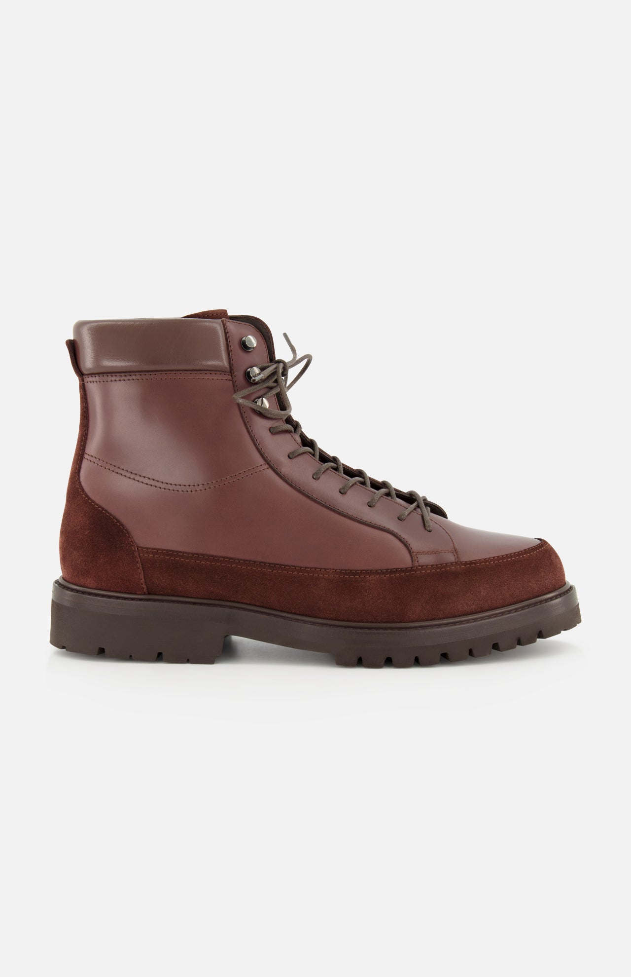 A single BRUNELLO CUCINELLI Leather and Suede Ankle Boot, inspired by classic hiking boots and featuring a thick, ridged sole, is shown in profile against a plain white background.