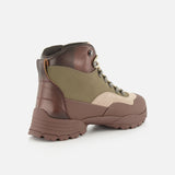 A single BRUNELLO CUCINELLI Ankle Hiker Boot, featuring brown, olive green, and beige suede and leather panels with a rugged sole and lace-up design, is shown from the back-left angle against a white background.