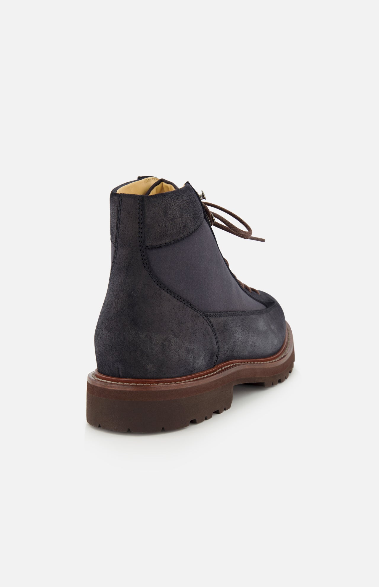 A pair of BRUNELLO CUCINELLI Suede Ankle Boots, featuring a rich dark blue suede upper with lace-up design and a brown rubber sole, is shown from the back against a white background.
