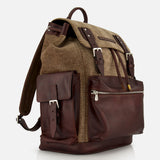 A Vintage Chevron-effect Backpack by BRUNELLO CUCINELLI, featuring brown leather and beige herringbone fabric with multiple pockets, buckles, leather inserts, a top handle, and adjustable shoulder straps, shown on a white background.