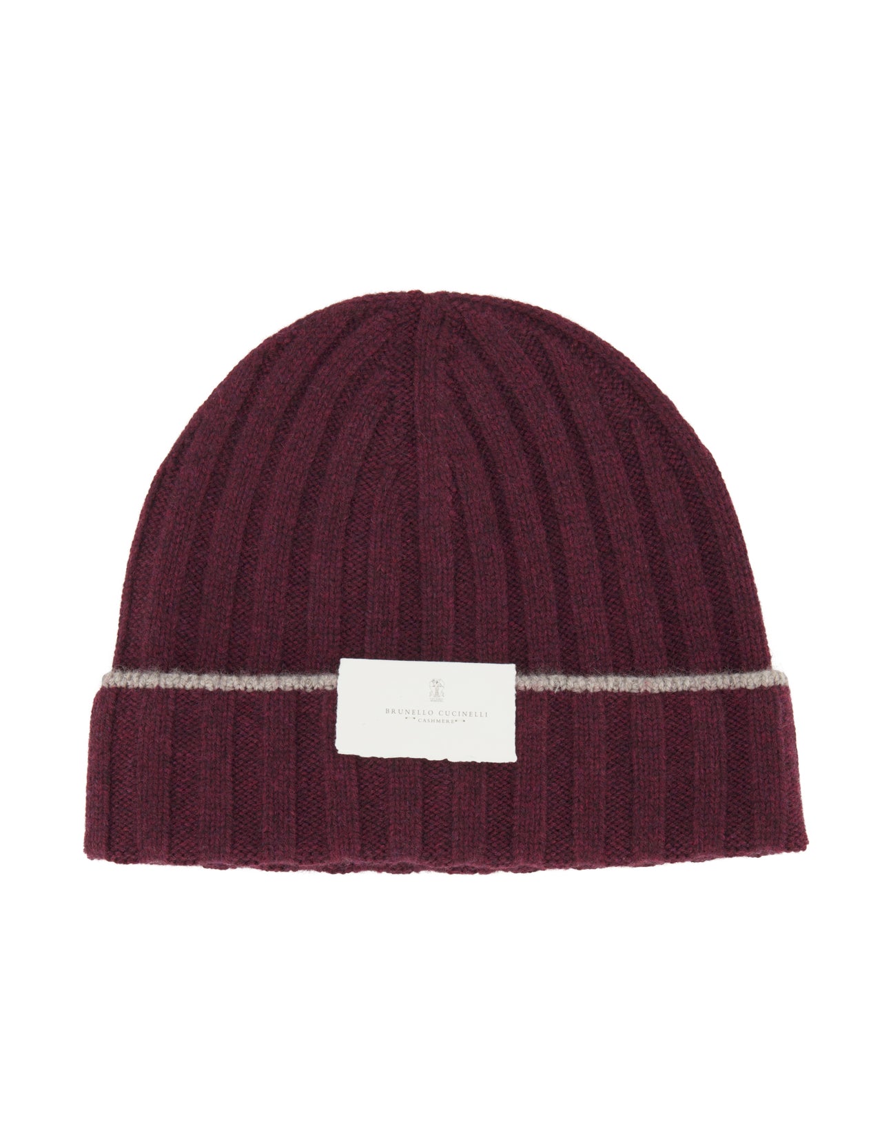 Introducing the Rib-knit Cashmere Beanie by BRUNELLO CUCINELLI: a stylish burgundy hat crafted in a classic rib-knit design for added texture and warmth, featuring a folded brim with a thin gray stripe above it and finished with a white rectangular label on the front.