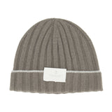 The Rib-knit Cashmere Beanie by BRUNELLO CUCINELLI features vertical ribbing in gray, a thin white stripe near the folded cuff, and a white rectangular label on the front.