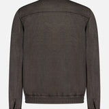 A back view of the BRUNELLO CUCINELLI Wool Bomber Jacket in dark gray, featuring long sleeves, a collar, and buttoned cuffs, crafted in classic virgin wool bomber style and displayed against a plain white background.