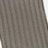 Close-up of the soft ribbed knit fabric in a neutral beige hue, highlighting vertical textured lines from the BRUNELLO CUCINELLI Cashmere Contrast Stripe Scarf, crafted in Italy.