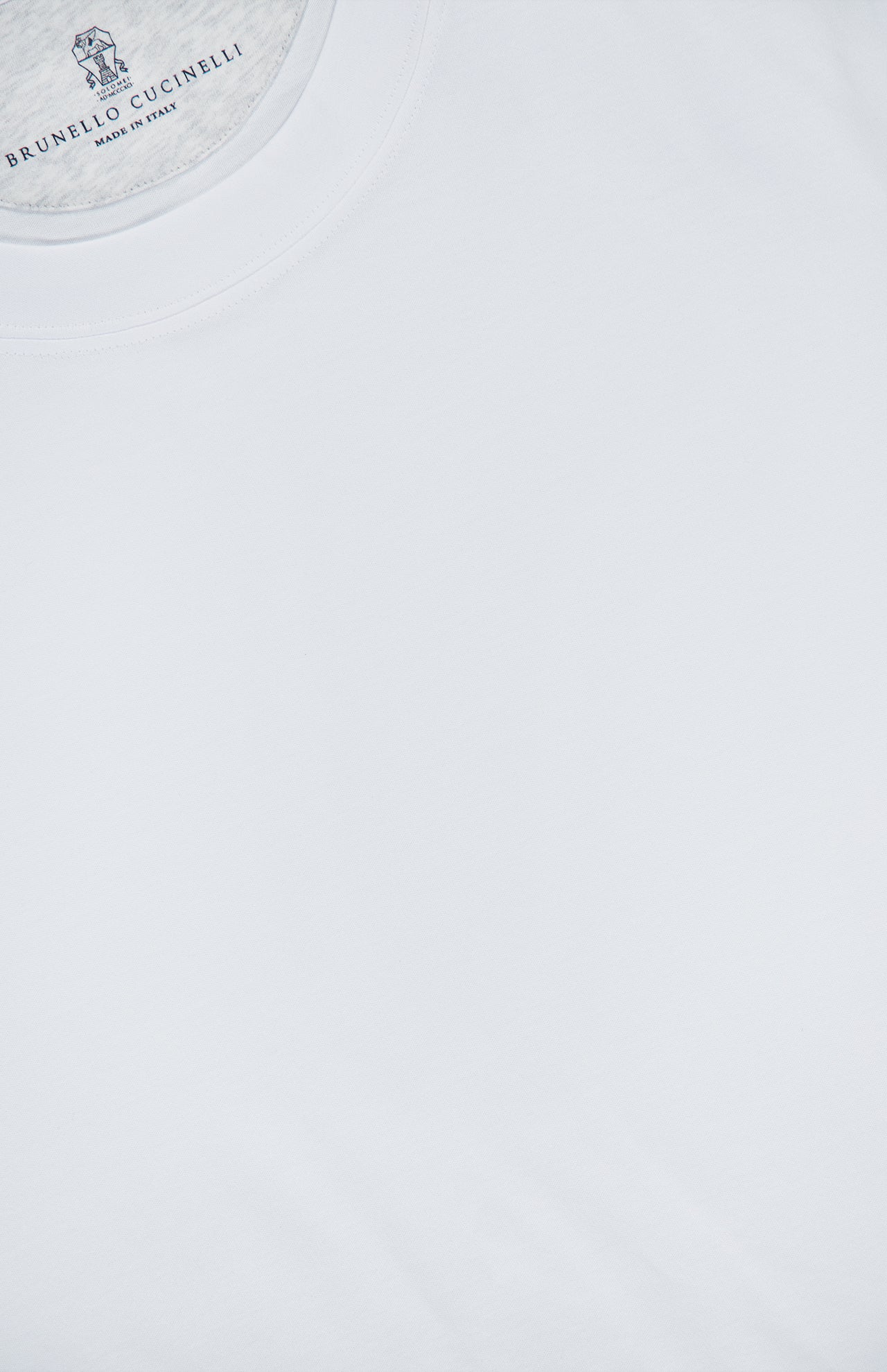 Close-up view of the BRUNELLO CUCINELLI Cotton Crewneck T-Shirt in a slim fit, highlighting part of the collar and the brand label printed on the inside neck, with “Made in Italy” clearly visible.