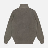 The BRUNELLO CUCINELLI Cotton Zip Up Cardigan Sweater is displayed laid flat, back facing up, against a plain white background. Featuring ribbed detailing, long sleeves, a high collar, and elastic cuffs and hem, this versatile olive green piece is crafted from 100% cotton for exceptional comfort and enduring style—a timeless addition to any wardrobe.
