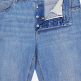 Introducing the Button Fly Denim Jeans by BRUNELLO CUCINELLI, crafted from premium Italian denim in a light blue wash. These jeans feature a partially open front with signature silver button fly closures, belt loops, and a white size 48 label inside the waistband. Finely finished with a subtle vintage treatment, this classic five-pocket design ensures timeless style and enduring quality.